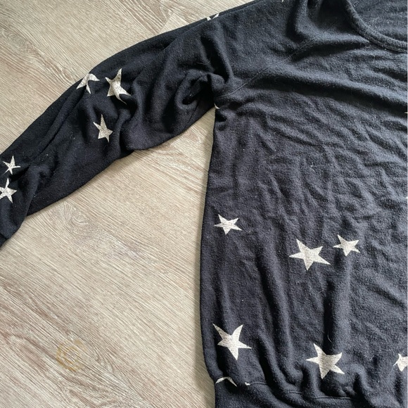 Longer black sweater with white stars. - Picture 2 of 6